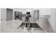 Elegant kitchen featuring stainless steel appliances, granite countertops, and a modern sink at 5086 Sw 91St St, Ocala, FL 34476