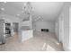 Open-concept living space with island, modern flooring, and natural light at 5086 Sw 91St St, Ocala, FL 34476