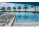 Beautiful community pool with a spacious deck area and a clear view of the surrounding landscape at 5563 Nw 40Th Pl, Ocala, FL 34482