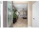 Inviting foyer leads to a spacious living area, with large tile flooring and natural light at 5563 Nw 40Th Pl, Ocala, FL 34482