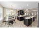 Bright kitchen with an island, stainless steel appliances, adjacent breakfast nook and seamless access to the living area at 5563 Nw 40Th Pl, Ocala, FL 34482