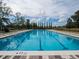 Inviting lap pool with marked lanes, offering a refreshing and recreational fitness experience at 5563 Nw 40Th Pl, Ocala, FL 34482