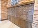Locker room area with wood lockers and a textured wall at 5563 Nw 40Th Pl, Ocala, FL 34482