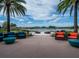 Inviting outdoor seating area with comfortable lounge chairs and scenic waterfront views at 5563 Nw 40Th Pl, Ocala, FL 34482