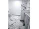 Bathroom with a sink, marble-look tiled floors, and a shower at 5860 Sw 64Th Street Rd, Ocala, FL 34474