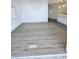 Open-concept living room with recessed lighting and wood-look floors at 5860 Sw 64Th Street Rd, Ocala, FL 34474