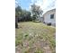 An expansive sunny yard with space for outdoor activities and potential landscaping at 5860 Sw 64Th Street Rd, Ocala, FL 34474