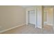 Carpeted bedroom featuring a closet at 6047 Sw 128Th Street Rd, Ocala, FL 34473