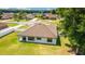 Aerial view showcasing the home, its expansive backyard, and the surrounding neighborhood at 6125 Se 11Th St, Ocala, FL 34472