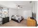 Bedroom with a ceiling fan, a double bed, and a large closet at 6125 Se 11Th St, Ocala, FL 34472
