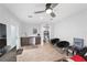 Versatile bonus room complete with kitchenette, seating area, and convenient access to a bathroom at 6125 Se 11Th St, Ocala, FL 34472