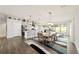 Bright, open-concept kitchen with a large center island, dining area and modern fixtures at 6125 Se 11Th St, Ocala, FL 34472
