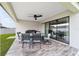 Covered patio offering an ideal space for outdoor dining and relaxation at 6125 Se 11Th St, Ocala, FL 34472