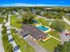 Overhead shot of the community center with a pool, pond, and recreation area for residents at 9095 Sw 104Th Ln, Ocala, FL 34481