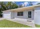 Charming one-story home with a well-manicured lawn and neutral color scheme at 9607 Se 122Nd Pl, Belleview, FL 34420
