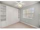 Bright, spare bedroom with built-in storage and a large window at 9770 Sw 97Th Pl, Ocala, FL 34481