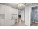 Bright, multi-purpose room with built-in cabinets and an attached bathroom at 9770 Sw 97Th Pl, Ocala, FL 34481