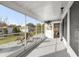 Screened-in porch featuring a view of the backyard and sliding windows at 9770 Sw 97Th Pl, Ocala, FL 34481