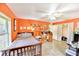 Well-lit bedroom features a work space and a built-in closet for extra storage at 9795 Ne 303Rd Ave, Salt Springs, FL 32134