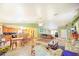 Inviting open-concept living space with a kitchen, dining area, and comfortable seating; it's perfect for entertaining at 9795 Ne 303Rd Ave, Salt Springs, FL 32134