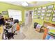 Bright and airy office space with built-in storage, a desk, and a window creates an ideal workspace at 9795 Ne 303Rd Ave, Salt Springs, FL 32134