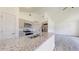 Modern kitchen with granite countertops, stainless steel appliances, and ample cabinet space at 13627 Sw 103Rd Pl, Dunnellon, FL 34432