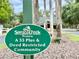 Spruce Creek Preserve: A 55 Plus and Deed Restricted Community sign with lush greenery at 13686 Sw 111Th Ave, Dunnellon, FL 34432