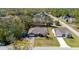 Aerial view of a single Gathering home showing surrounding neighborhood, landscaping, and proximity to nearby amenities at 16272 Se 89Th Ct, Summerfield, FL 34491