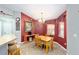Bright dining area with tile floor and adjacent breakfast bar and kitchen at 16272 Se 89Th Ct, Summerfield, FL 34491
