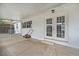 An enclosed patio space with access to backyard and house at 1818 Se Lake Weir Ave, Ocala, FL 34471