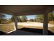Covered back patio overlooking the spacious backyard at 19 Juniper Pass, Ocala, FL 34480