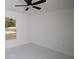 Well-lit bedroom with a window and neutral walls, offering a serene and comfortable space at 19 Juniper Pass, Ocala, FL 34480