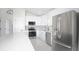 Bright, modern kitchen featuring stainless steel appliances, sleek cabinets, and a view from the window at 19 Juniper Pass, Ocala, FL 34480