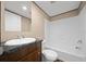 Bathroom with a vanity, toilet, and shower and tub combo at 221 Se 167Th Ct, Silver Springs, FL 34488