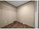 Empty closet with wood floors, wire shelving and beige walls at 221 Se 167Th Ct, Silver Springs, FL 34488