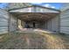 Large metal barn with open doors and overhead lighting at 221 Se 167Th Ct, Silver Springs, FL 34488