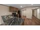 Kitchen featuring wood cabinets and a black countertop with black appliances at 221 Se 167Th Ct, Silver Springs, FL 34488