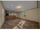 Bright living room with wood flooring and a view into the adjacent kitchen at 221 Se 167Th Ct, Silver Springs, FL 34488