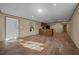 Spacious living room with wood floors and light-colored walls providing a bright and airy feel at 221 Se 167Th Ct, Silver Springs, FL 34488