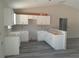 Unfinished kitchen with ample storage space, awaiting your personal touch to create a culinary haven at 29 Fisher Ter, Ocklawaha, FL 32179
