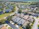 An aerial view of a quiet neighborhood showcases the real estate and its surrounding community at 3312 Sw 38Th Pl, Ocala, FL 34474