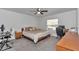 Comfortable bedroom featuring neutral tones, a ceiling fan, and lots of natural light at 5620 Sw 172Nd Loop, Ocala, FL 34473