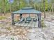 Backyard gazebo featuring comfortable seating, a coffee table, and peaceful, natural surroundings at 5620 Sw 172Nd Loop, Ocala, FL 34473