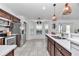 Bright kitchen with stainless steel appliances and tiled floors at 5620 Sw 172Nd Loop, Ocala, FL 34473