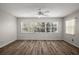 Bright bedroom with lots of light, wood floors and a ceiling fan at 9025 Sw 94Th Ln # C, Ocala, FL 34481
