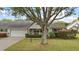 Charming single-story home with a well-manicured lawn and mature landscaping at 9025 Sw 94Th Ln # C, Ocala, FL 34481
