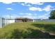 Large, fully fenced backyard offers ample space for recreation and outdoor activities at 9436 Se 163Rd St, Summerfield, FL 34491