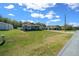 Well-maintained home with a large front yard and an inviting front entrance at 9436 Se 163Rd St, Summerfield, FL 34491