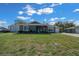 Well-maintained home with a large front yard and an inviting front entrance at 9436 Se 163Rd St, Summerfield, FL 34491