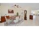 Elegant dining room featuring a wooden table and seamless tile flooring at 9575 Sw 92Nd Street Rd, Ocala, FL 34481